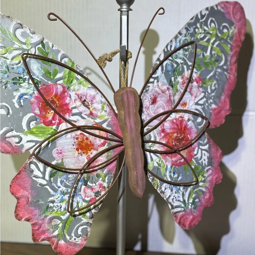 Metal butterfly w/wood accents Hanger on back Perfect for a patio or inside 18.5